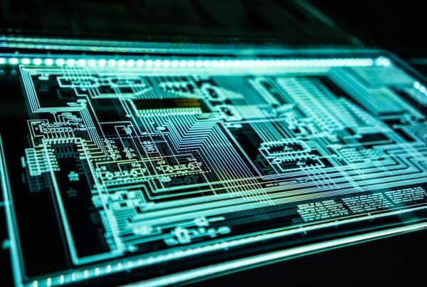Abstract digital circuit board with glowing blue and white lines on a dark background, conveying a futuristic and technological feel. Data diode